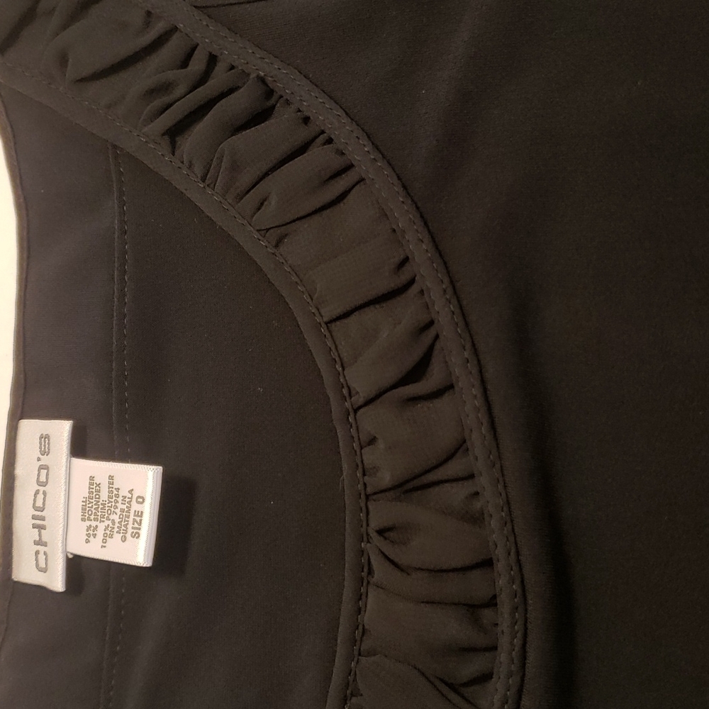 Chico's size 0 black take top.       B54 - Picture 7 of 8